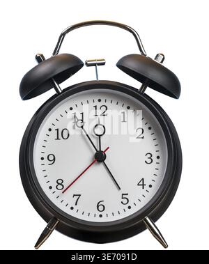 Time running out concept with alarm clock approaching midnight and isolated against white background Stock Photo