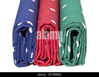 Folder linen handkerchiefs in red blue and green with white spots Stock Photo
