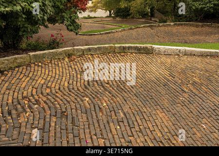 Patterns in the brick paving on Snake Alley in Burlington Iowa which has the world record for steepest bendy street Stock Photo