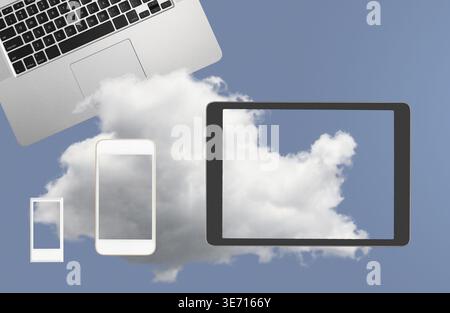 Concept image for cloud computing and online applications showing modern smartphone held in male hand up to sky Stock Photo