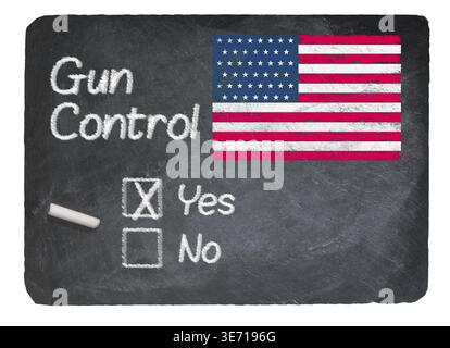 Gun Control voting choice message written on a chalky natural slate blackboard with yes checkbox filled and chalk Stock Photo