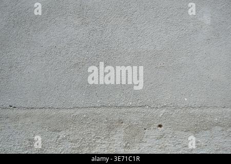 Gray cement texture background with crack minimal industrial wall surface abstract neutral backdrop copy space Stock Photo