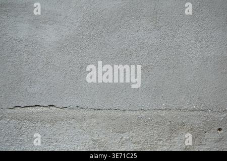 Concrete wall texture with subtle crack gray minimal background industrial cement surface abstract neutral copy space Stock Photo