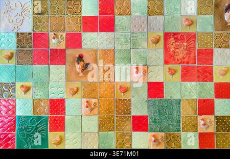 Chicken & hen mosaic tiled wall Stock Photo
