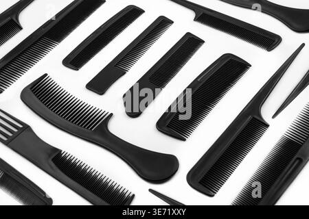 Various black hair combs on white background Stock Photo