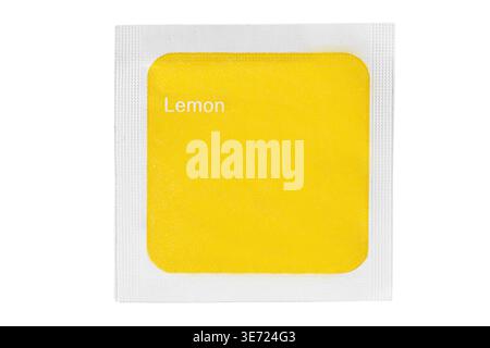 Yellow lemon aromatic paper sachet isolated on white background Stock Photo