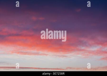 Colorful sunset sky with soft gradient clouds Stock Photo