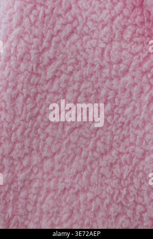 Soft and Fluffy Pink Sherpa Fleece Fabric Textile Background Texture Stock Photo
