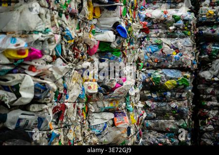 Compressed bales of plastic waste ready for recycling and resource recovery Stock Photo