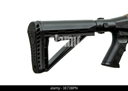 Close up of a black tactical telescopic buttstock isolated on white background. Stock Photo