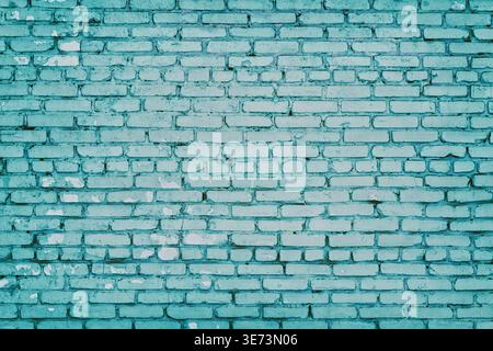 Old shabby painted brick wall. Aged brickwork texture. Blue masonry retro grunge background Stock Photo