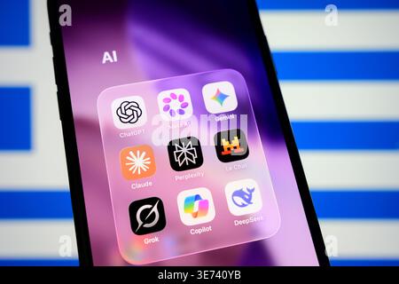 Paris, France - April 9, 2026: A smartphone displays an AI apps folder featuring the new Meta AI logo over a Greek flag wallpaper in Paris. Stock Photo