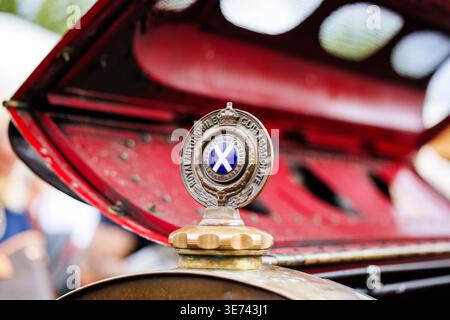 Velden, Austria - August 30, 2025: Classic car hood ornament with Royal Automobile Club emblem, highlighting vintage automotive craftsmanship at Oldti Stock Photo
