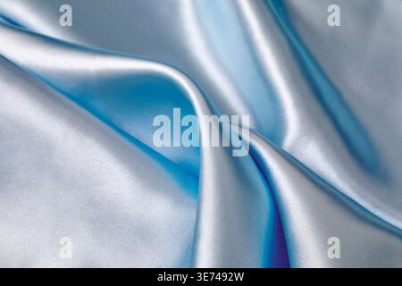 Close-up of folded light blue silk Stock Photo
