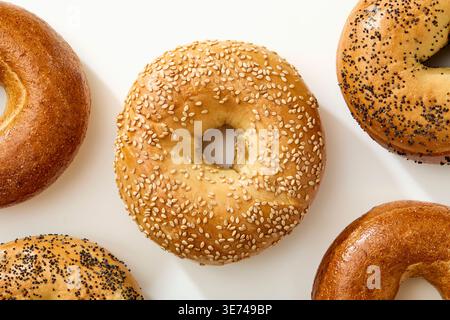 Overhead view of bagels on white background Stock Photo