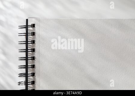 Close-up of open  spiral notebook Stock Photo