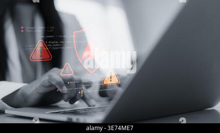 Cyber security alert with red warning icons on laptop screen.Hacker attack and data breach concept in modern office.System error and software vulnerab Stock Photo