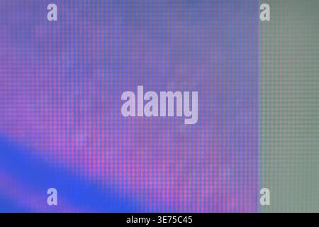 Close up macro shot of digital pixel grid texture with blue and purple light Stock Photo