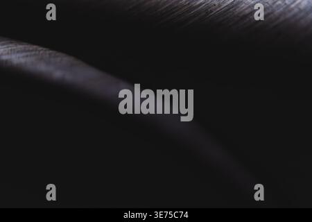 Deep black minimalist texture background with subtle metallic highlights Stock Photo