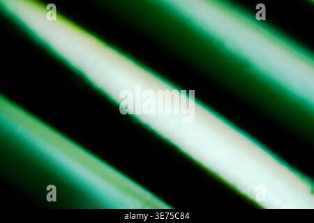 Abstract technological background with dynamic green light lines and gradient Stock Photo