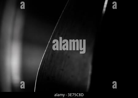 Abstract black and white macro background with curved texture and rim light Stock Photo