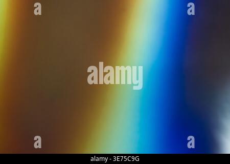 Warm orange to cool blue light leak gradient background Stock Photo