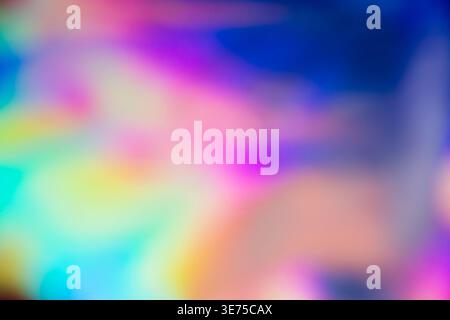 Vibrant neon pastel blurred gradient holographic texture background Stock Photo