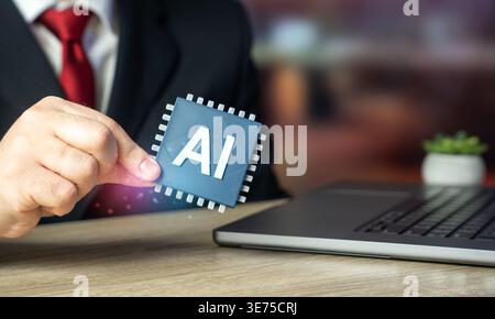 A businessman holding an AI chip. Innovative technologies in business. Digital transformation drives automation and efficiency. Artificial intelligenc Stock Photo