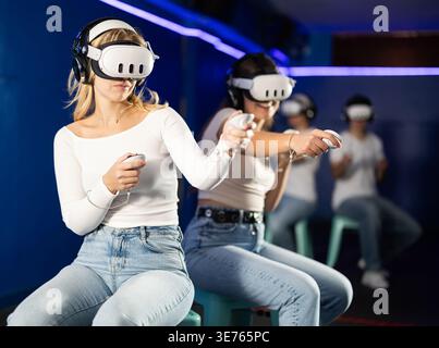 Two girls playing against boys Stock Photo