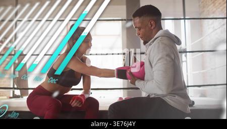 Punching boxer in sportswear throwing pink glove at trainer in ring holding mitt, teal graphic Stock Photo