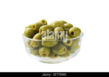 Marinated green pitted olives in a glass bowl isolated on a white background. marinated pitted olives. Pickled pitted green olives Stock Photo