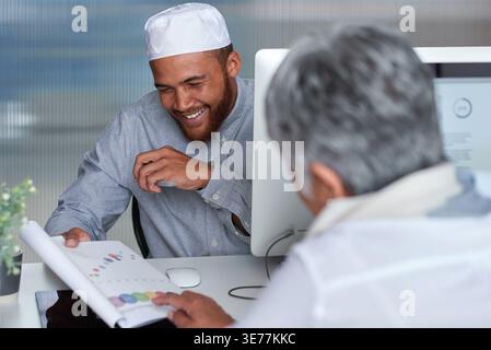 Documents, business and people in workplace, graphs for trading opportunity and economy analytics. Support, talk and financial advisor in office Stock Photo