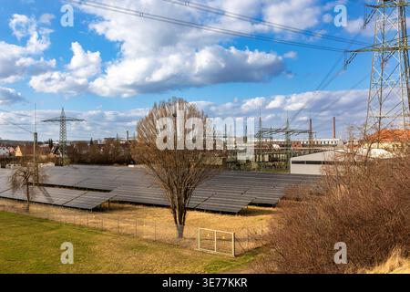 Solar park with substation at Lech river canal in Meitingen, Bavaria, Germany Stock Photo