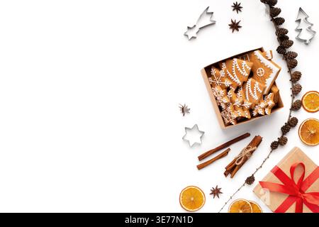 Gift box, christmas cookies and cinnamon sticks Stock Photo