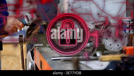 Grinding worker in blue jacket using angle grinder on workshop vise holding part, neon padlock icon Stock Photo