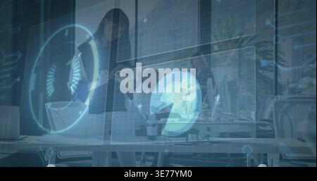 Discussing four-person team in office attire analyzing laptop and monitors at office, holograms Stock Photo