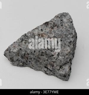 A detailed close up of a natural sodalite syenite stone specimen showing intricate mineral patterns Stock Photo