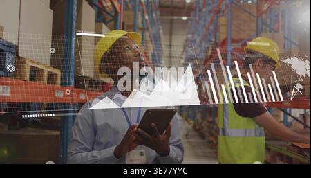 Diverse male team African American man holding tablet on stock alert using AR overlay in warehouse Stock Photo