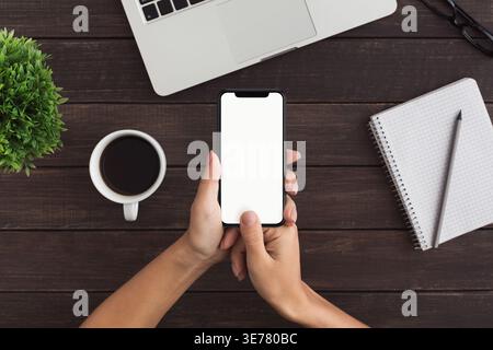 Female hands using smartphone for personal financial transaction Stock Photo