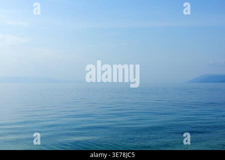 Calm Adriatic sea water surface with soft waves. Minimal natural background texture. Stock Photo