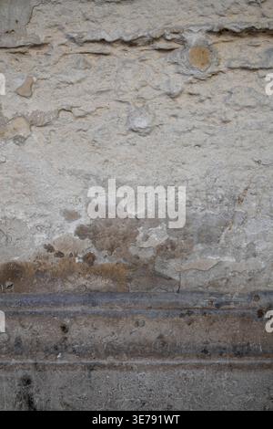 Textured weathered wall on historic London building Stock Photo