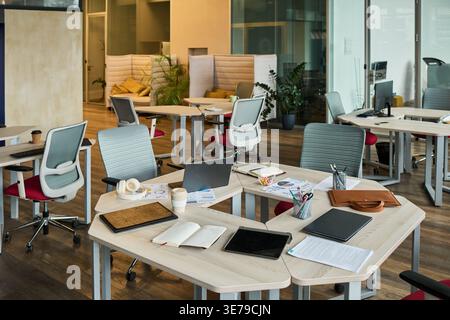 Modern Open Plan Office Workspace Supporting Hybrid Team Collaboration Stock Photo