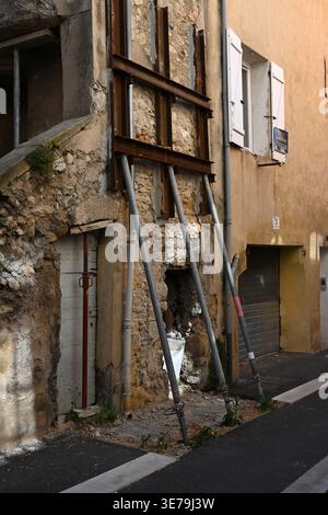 Dangerous House or Dilapidated Old Building Propped Up with Scaffolding in the Old Town or Distoric District Aix-en-Provence Provence France Stock Photo
