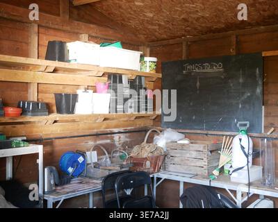 Garden potting shed interior at the Kitchen Garden at Sculpture by the Lakes, Pallington Lakes, Dorchester, Dorset, UK Stock Photo