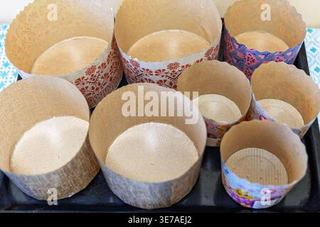 Paper Baking Molds for Easter Paska Bread on a Tray Stock Photo