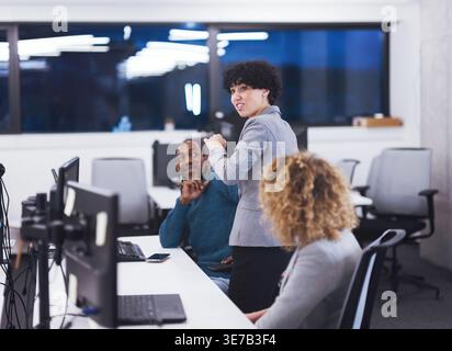 Diverse workmates having fun while working together in office Stock Photo