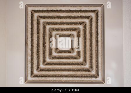 Dirty dust-filled hood in hotel or apartment bathroom, poor ventilation and air conditioning system. Stock Photo