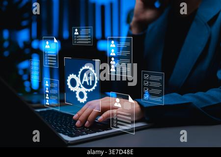 AI recruitment concept. Digital resumes and checklists above a laptop, showing automated candidate screening, talent evaluation, hiring workflow, HR a Stock Photo