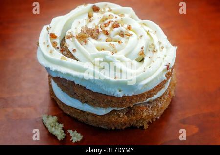 Mobile, Alabama, USA - April 2, 2026: A carrot cake cookie from Crumbl Cookies is pictured close-up in Mobile, Alabama. Crumbl was founded in Utah. Stock Photo