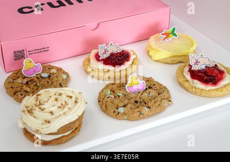 Mobile, Alabama, USA - April 2, 2026: Crumbl Cookies displays their Easter and spring collection of cookies in Mobile, Alabama. Stock Photo